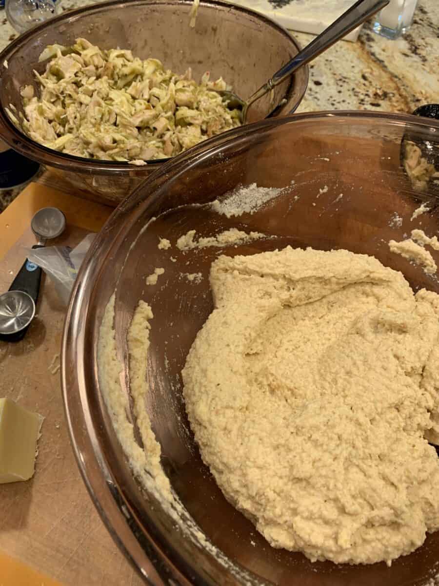 Tamale casserole ingredients in two bowls on the counter.