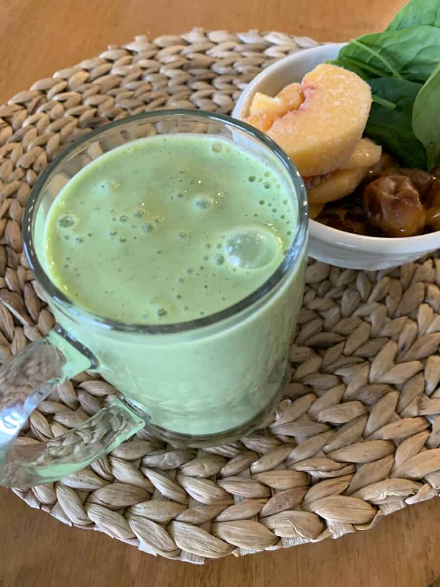 Smoothie and ingredients placed next to each other.