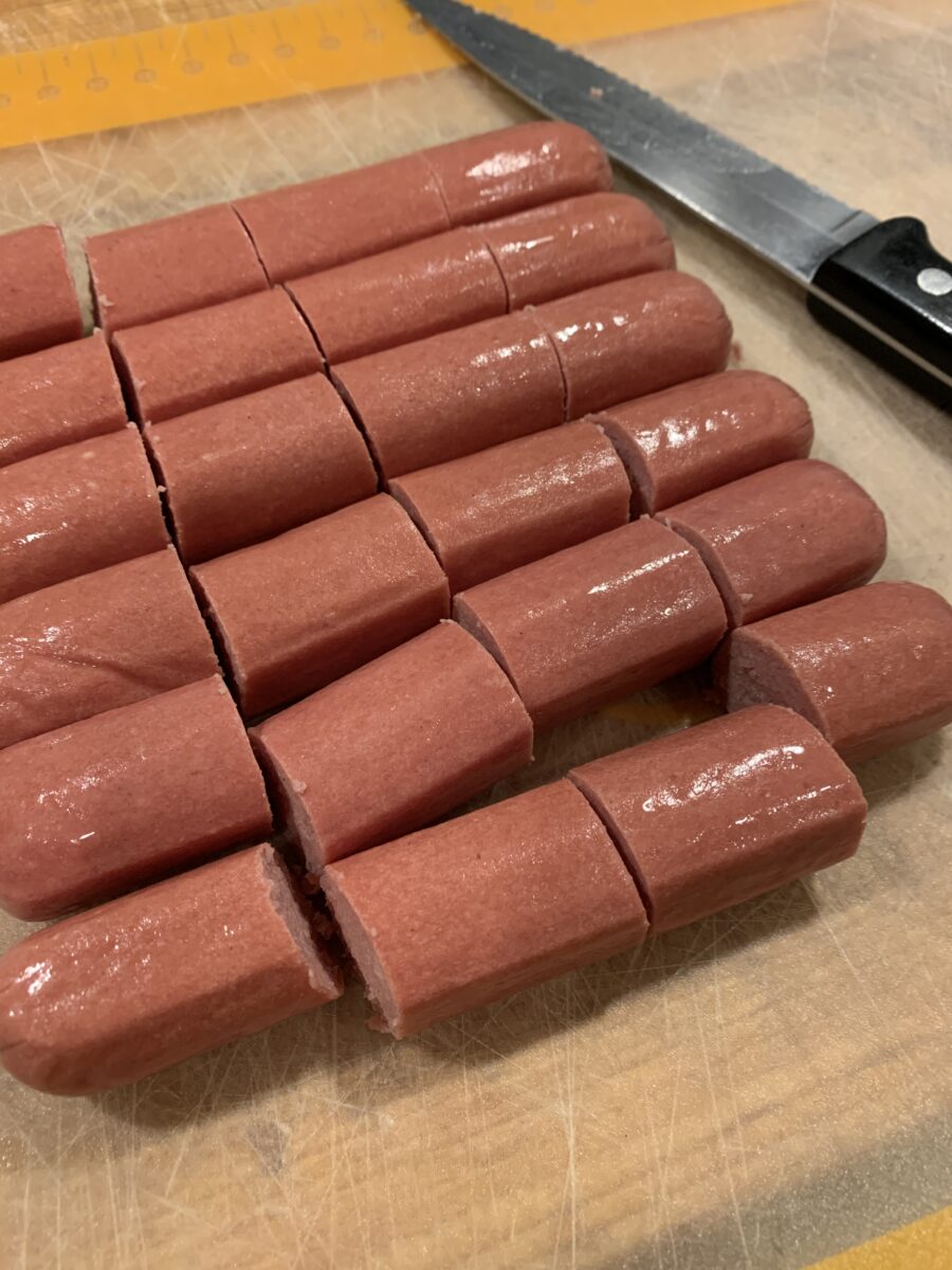 Six hot dogs sliced