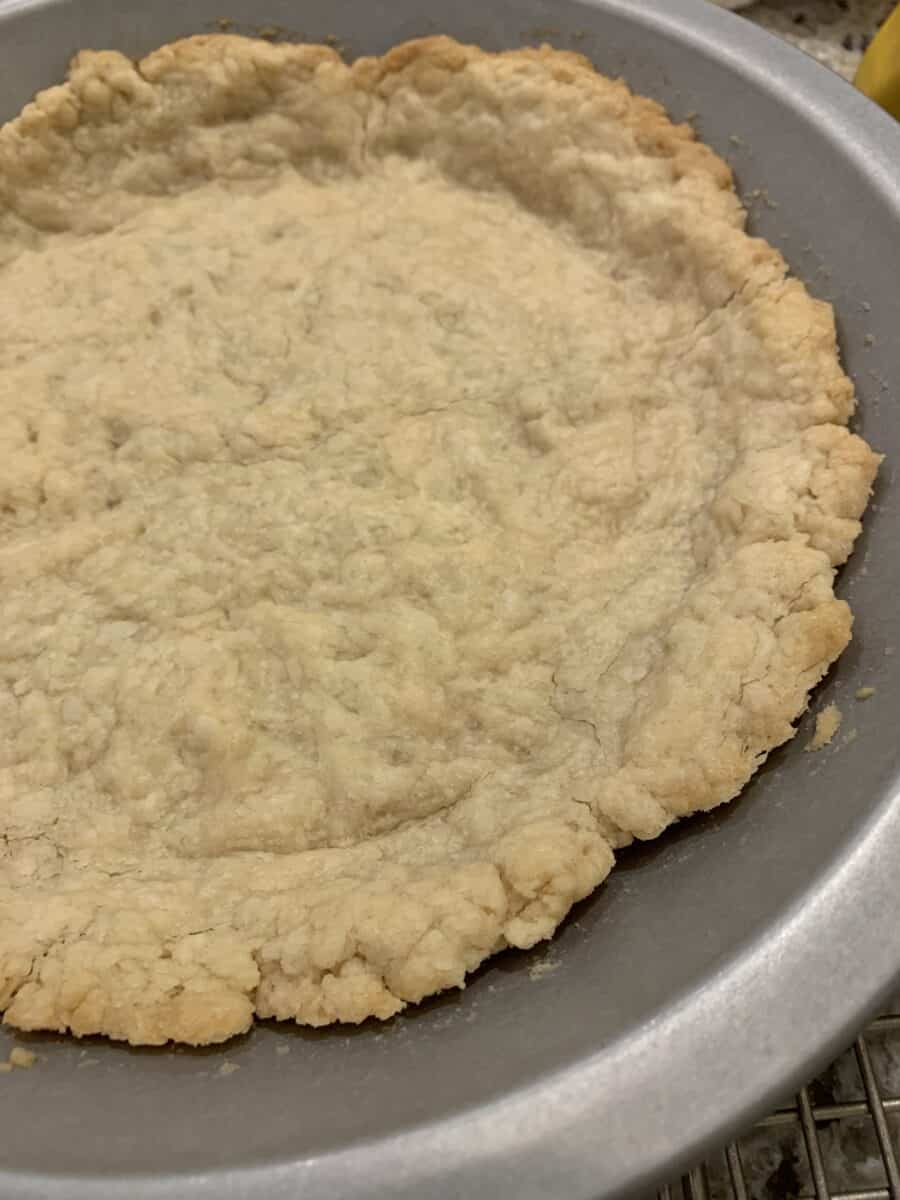 pie crust after baking, in a pie pan