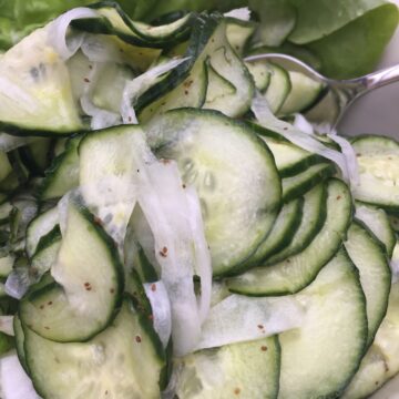 Sliced cucumbers and onion