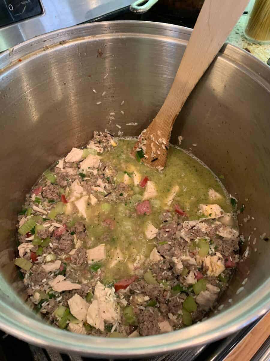 Jambalaya ingredients in a large stock pot.