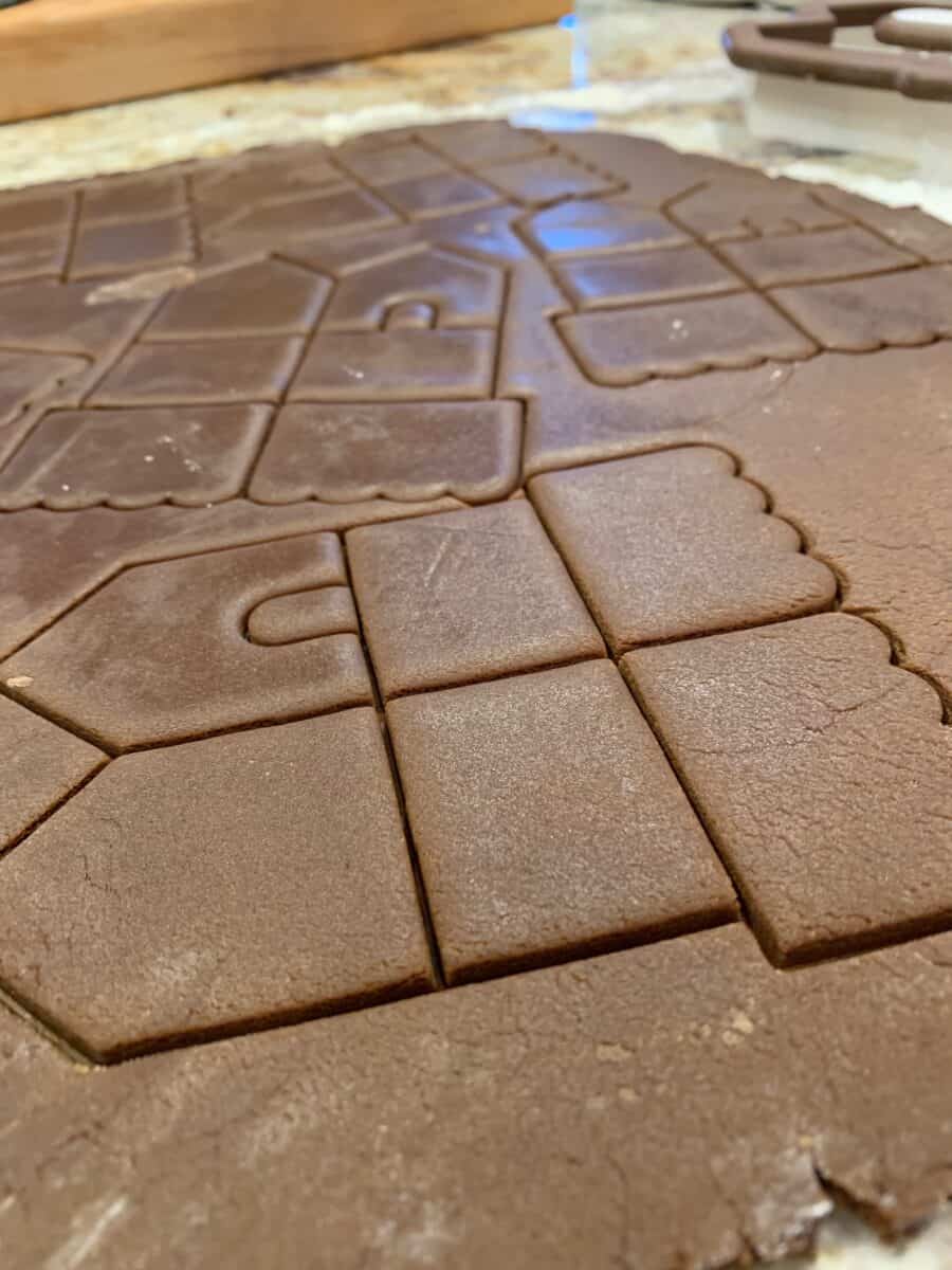 Gingerbread cookie dough with the lines created by the cookie cutter.