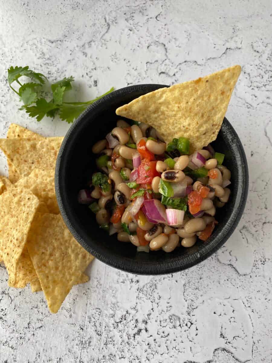 Salad served as a dip with tortilla chips.