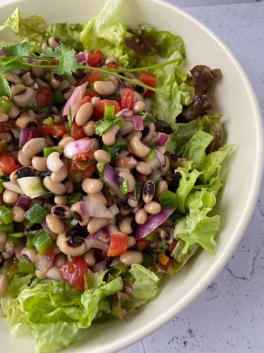 Black-eyed pea salad in a bowl, from the side. 