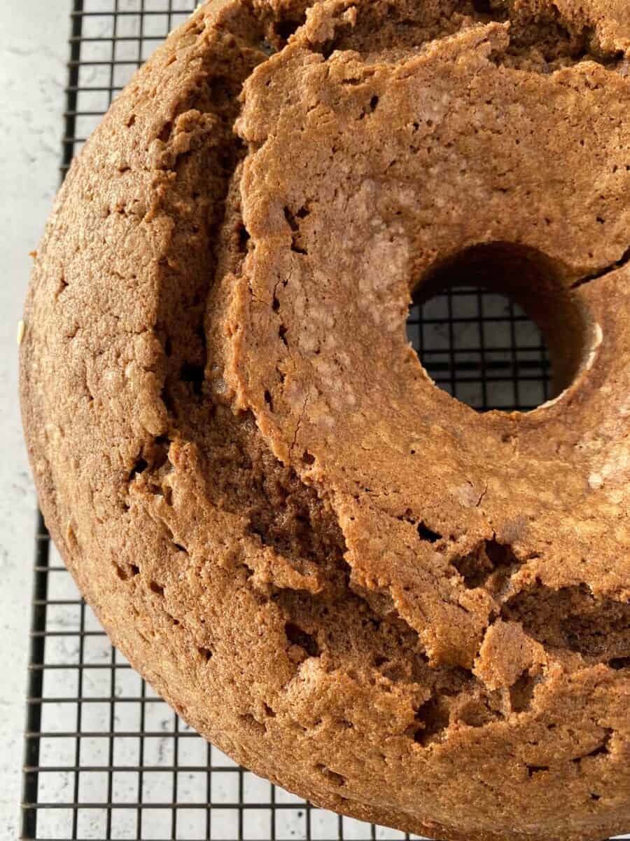 Baked pound cake on a cooling rack.