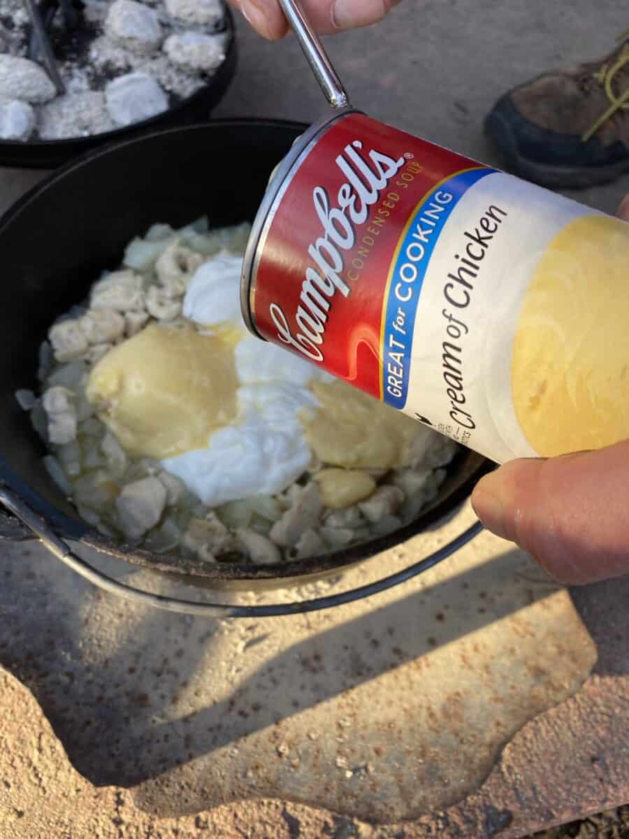 Soup and sour cream added to Dutch Oven.