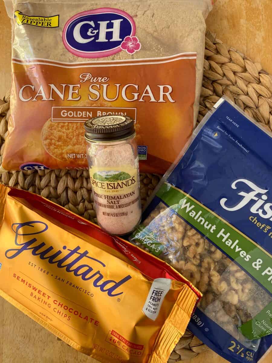 Ingredients for chocolate chip bars spread out on a cutting board.