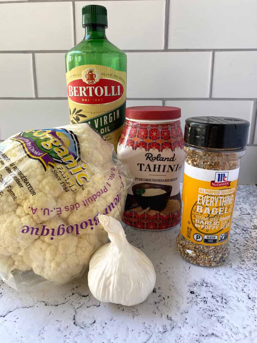 Cauliflower hummus ingredients on a counter. 