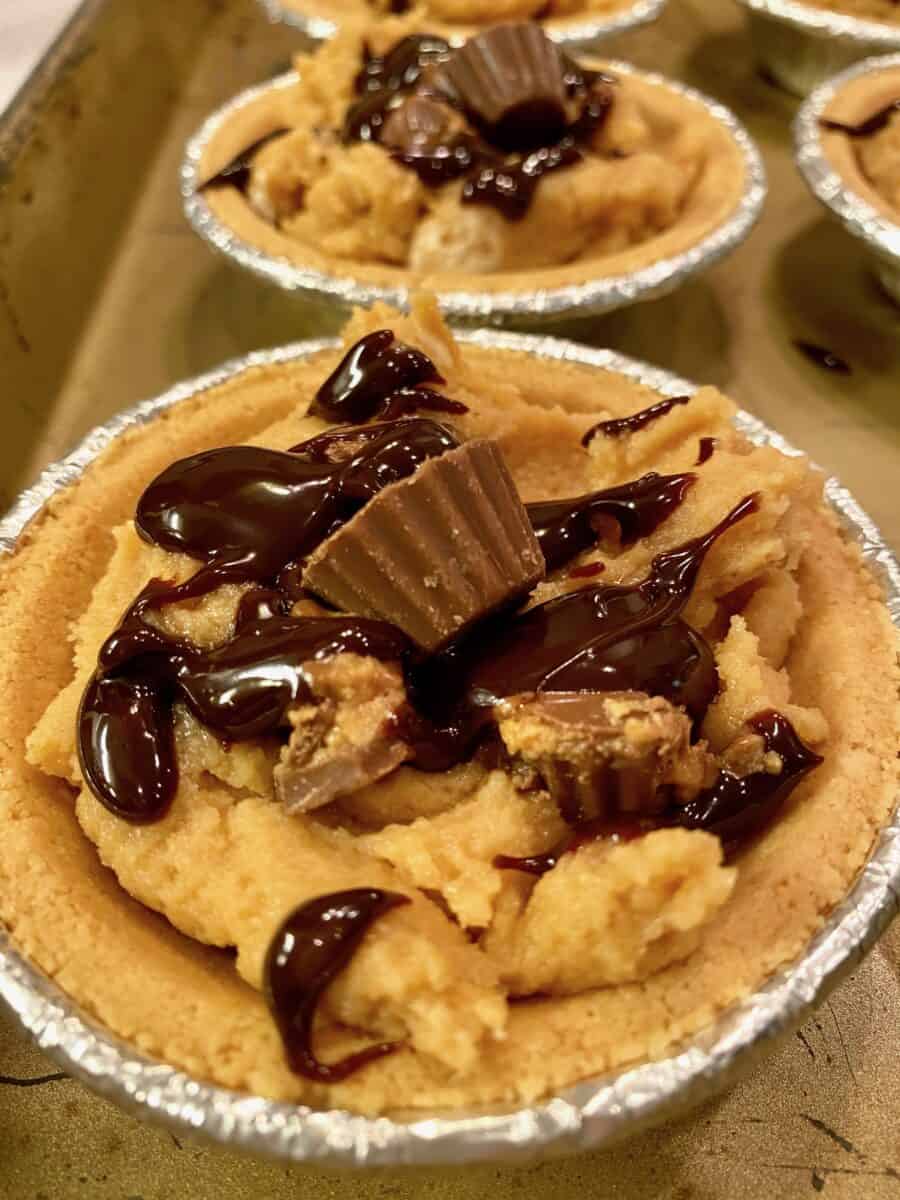 Reese's peanut butter mini pie with chocolate syrup on top