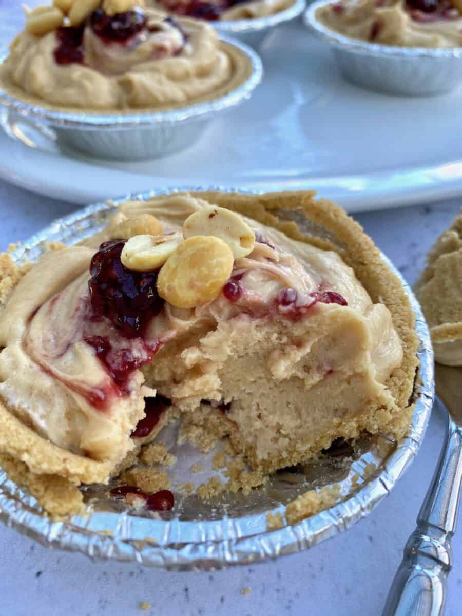 Peanut butter pie in a small dish with a scoop taken out