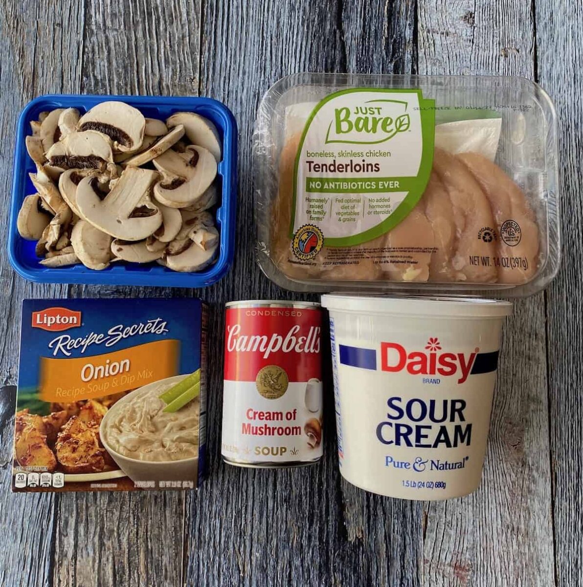 chicken stroganoff ingredients on wooden planks