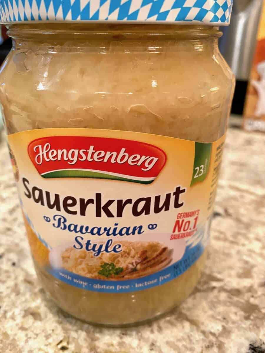 A jar of sauerkraut on the kitchen counter