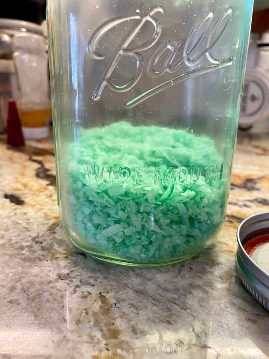 Shredded coconut in a glass jar, tinted. 