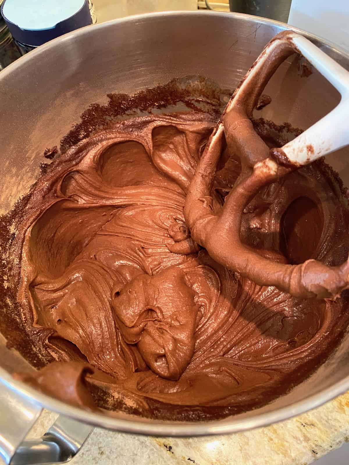 Brownie batter in a mixing bowl. 