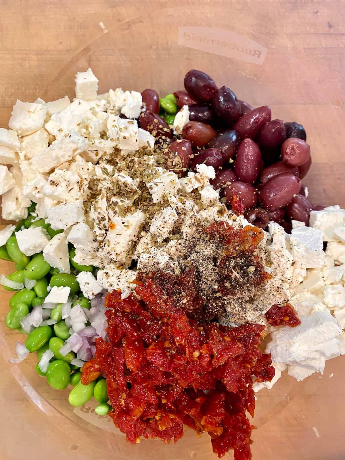 Edamame salad ingredients placed together in a bowl.