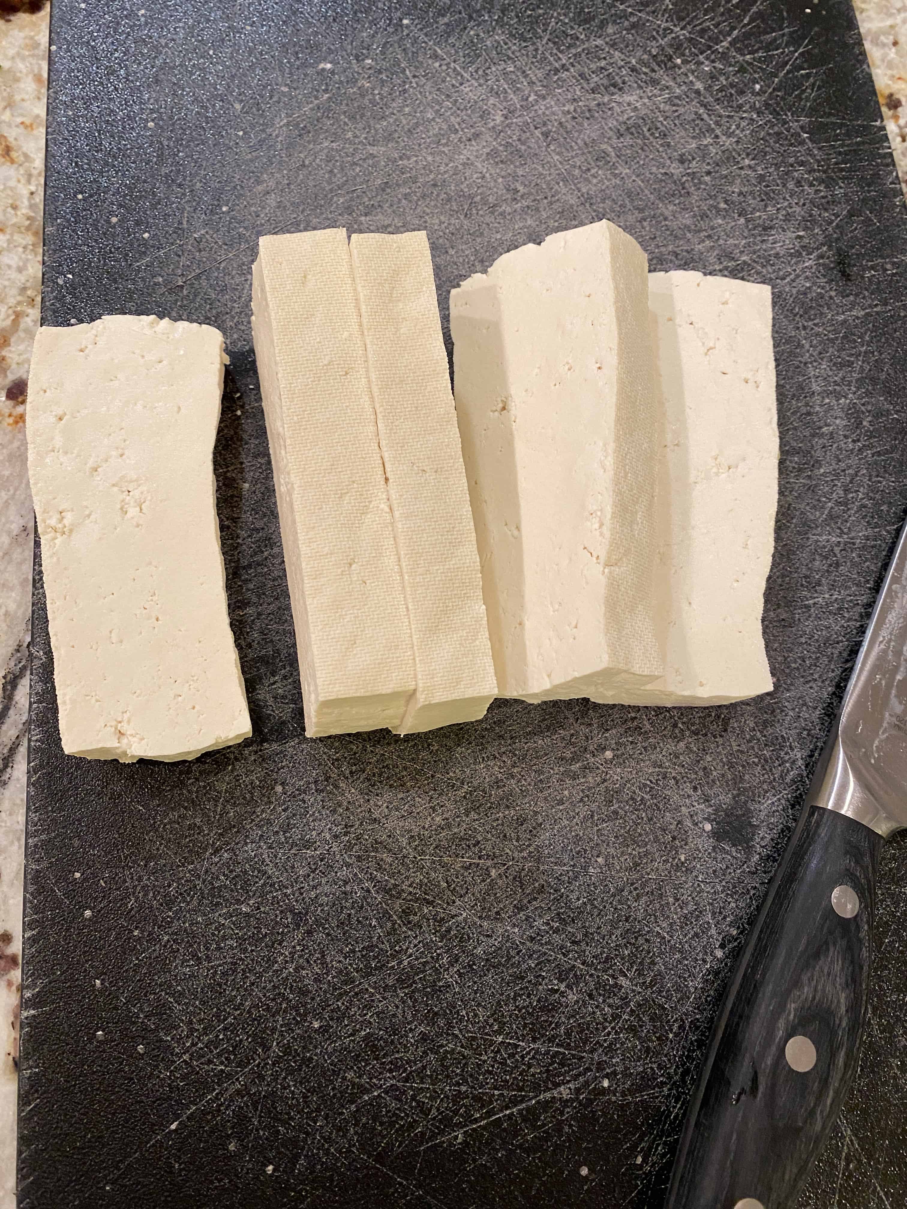 Thick slices of uncooked tofu.