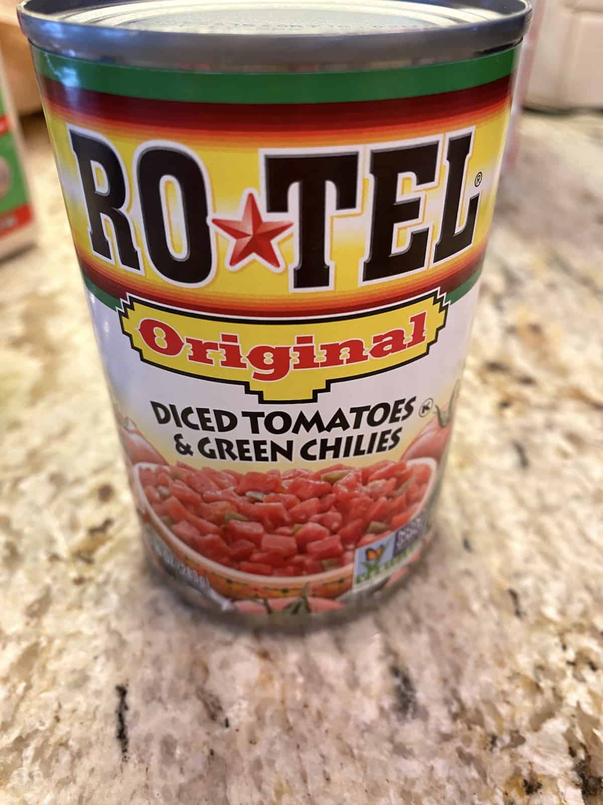 One can of original Rotel on a kitchen counter.