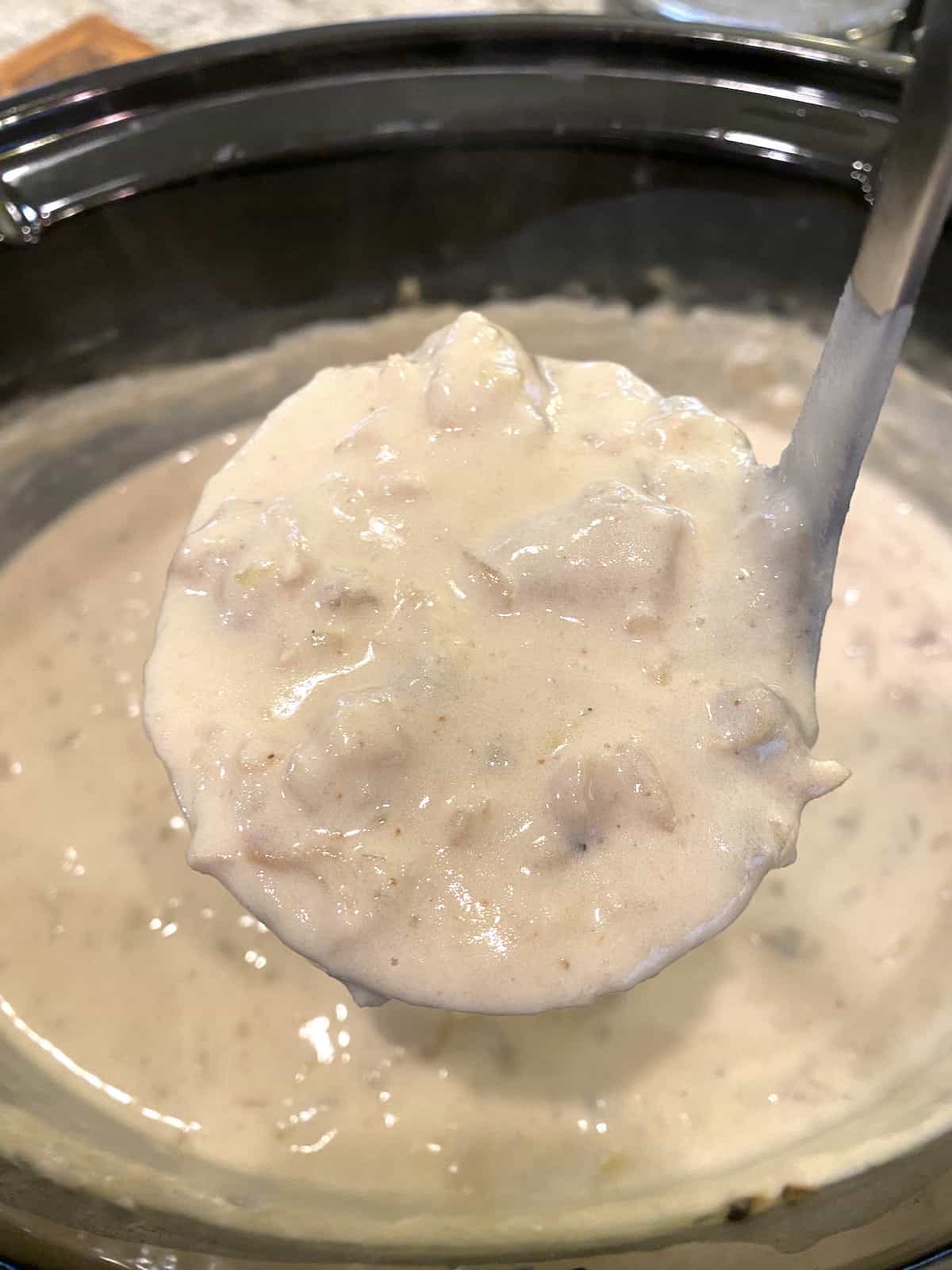 A scoop full of clam chowder.