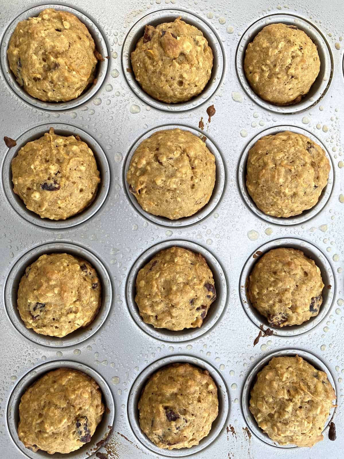 A pan of mini muffins, still in the muffin tin. 