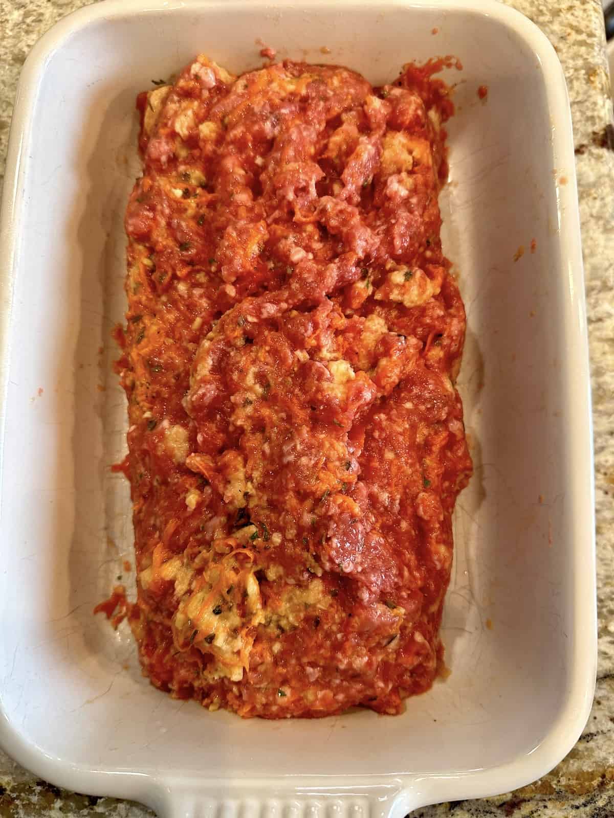 Unbaked no-ketchup meatloaf in a baking dish.