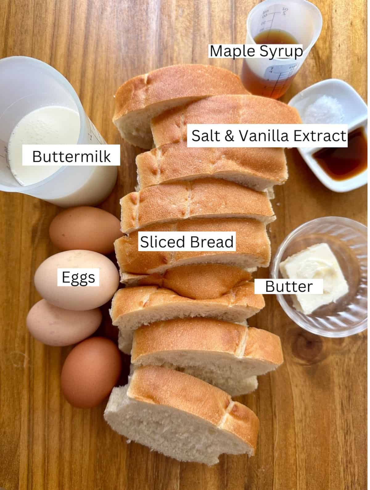 Ingredients for buttermilk french toast on a cutting board.