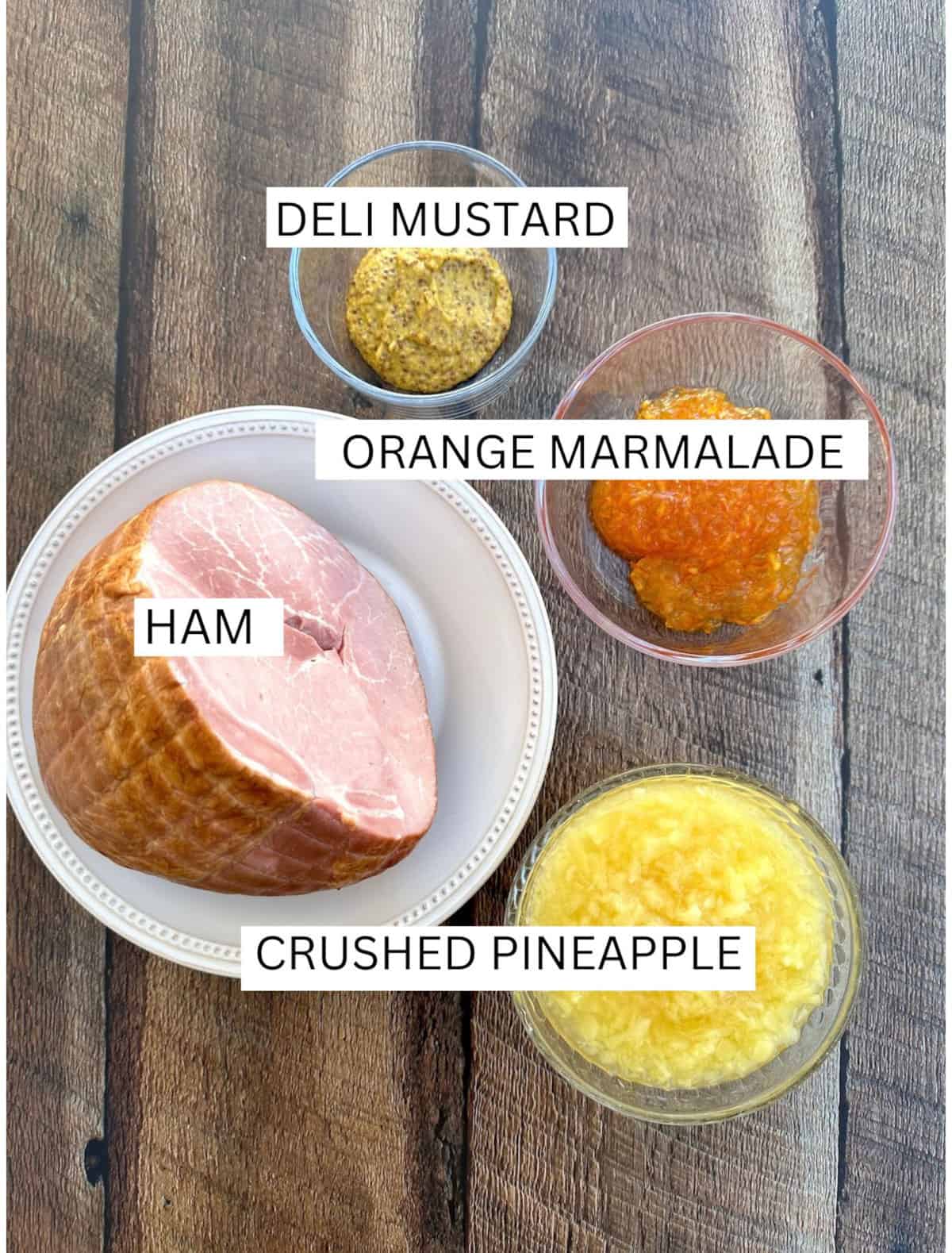 Ingredients for marmalade glazed ham on a table. 