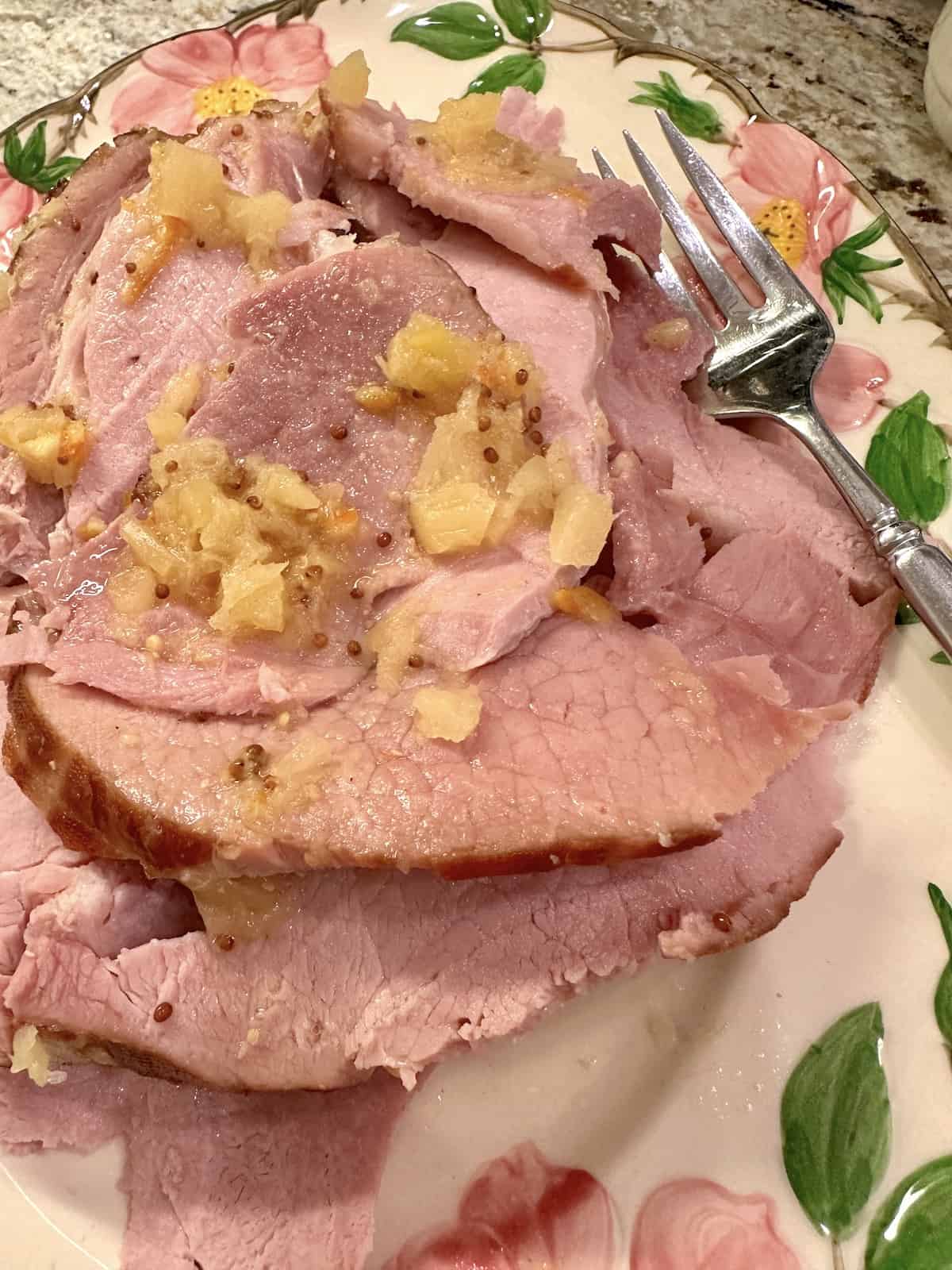 Sliced ham on a plate.