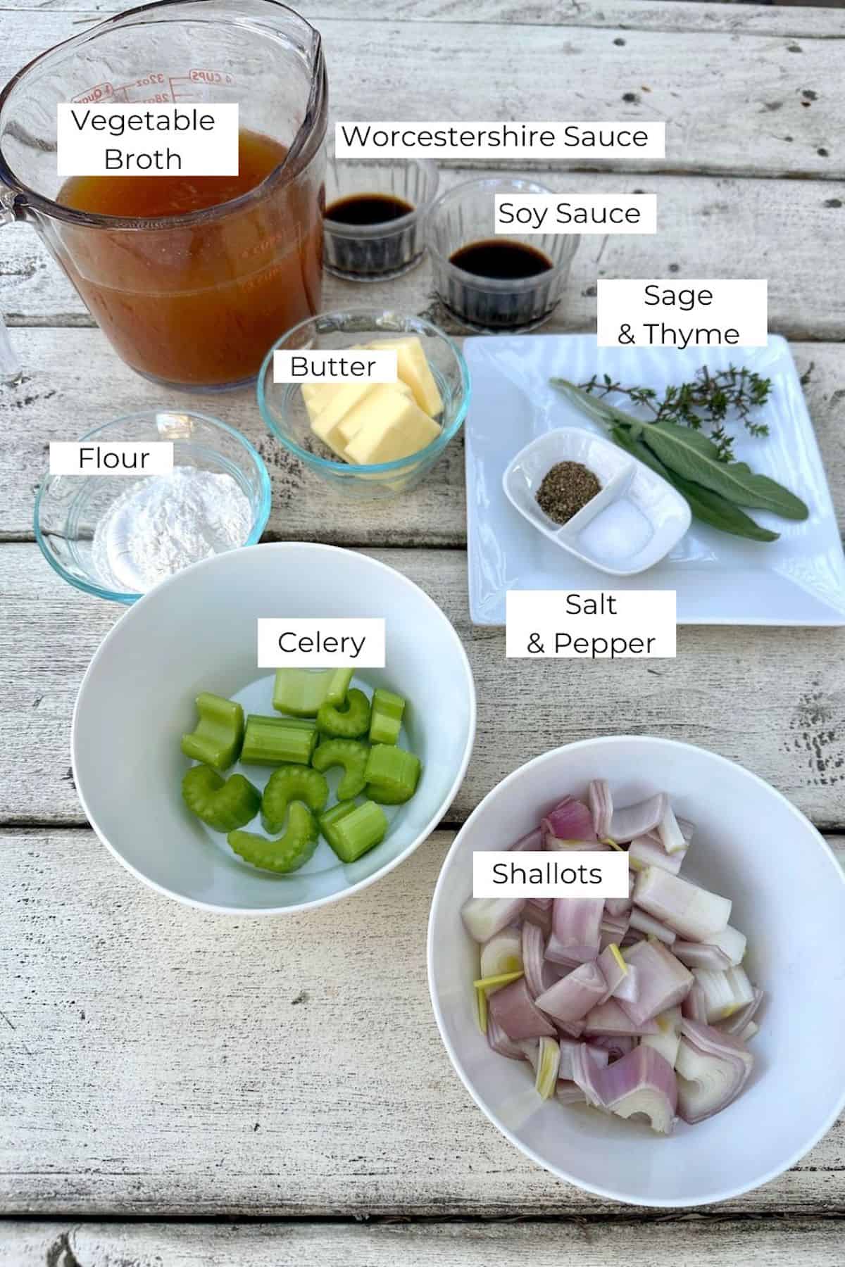 Ingredients for Make Ahead Gravy in small bowls on a table, with labels.