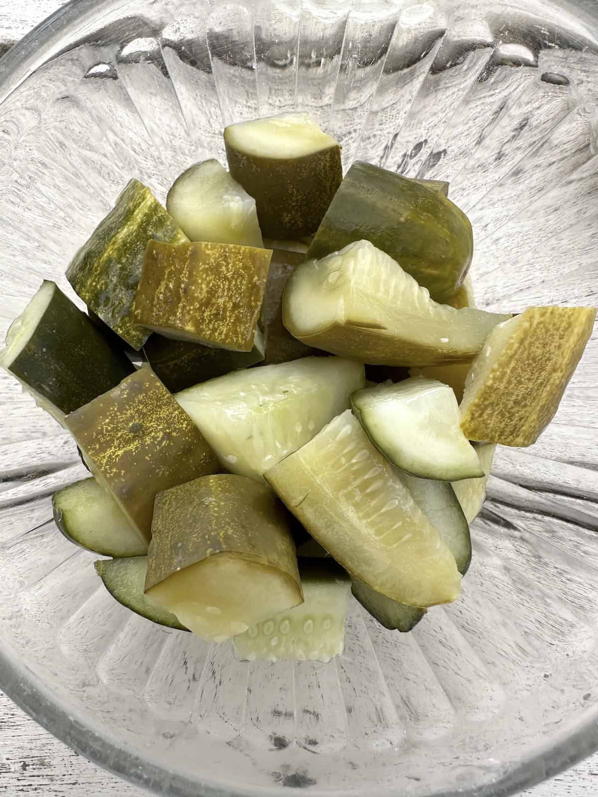 Diced pickles in a bowl.