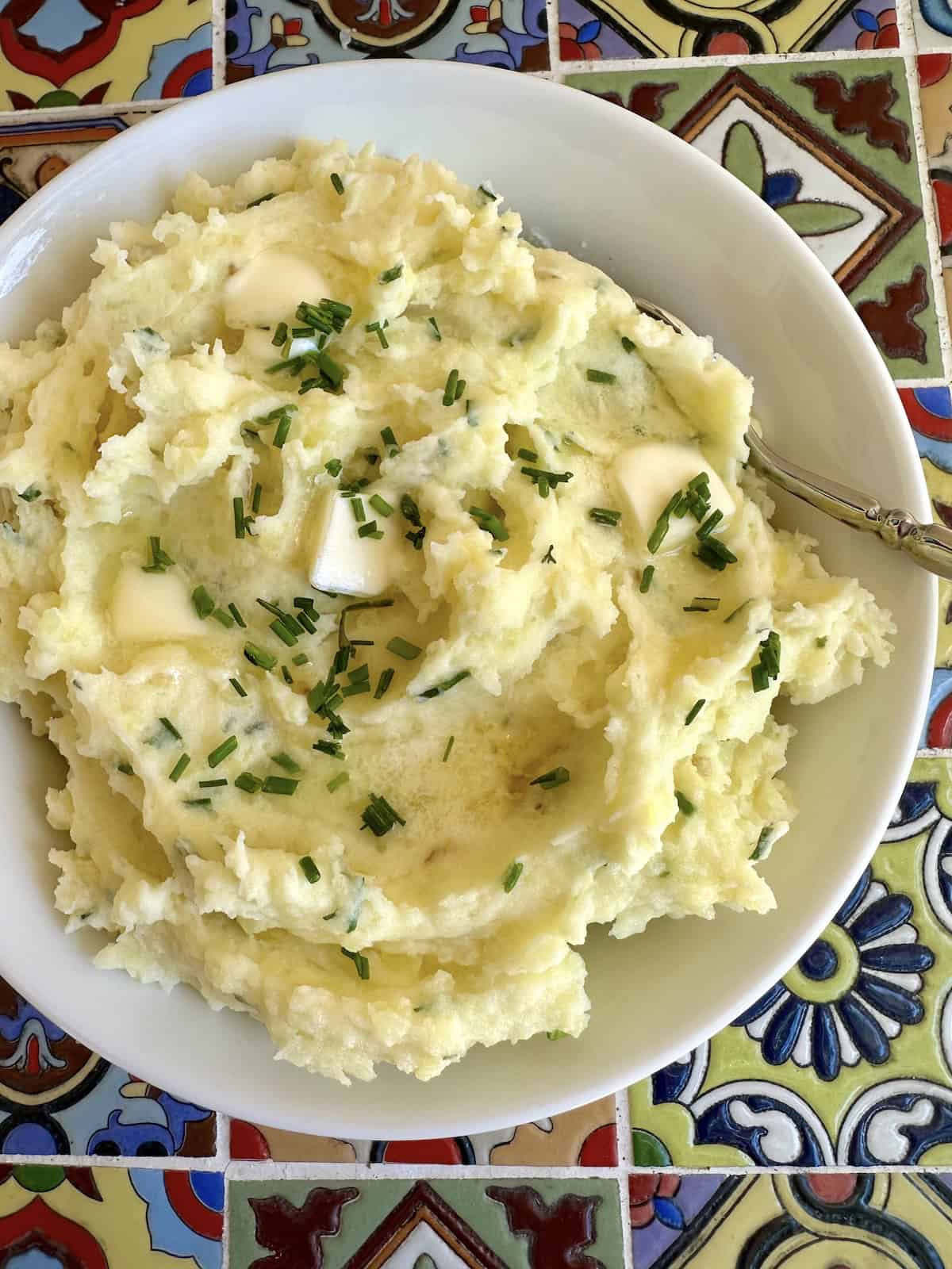 A bowl of yukon gold mashed potatoes.
