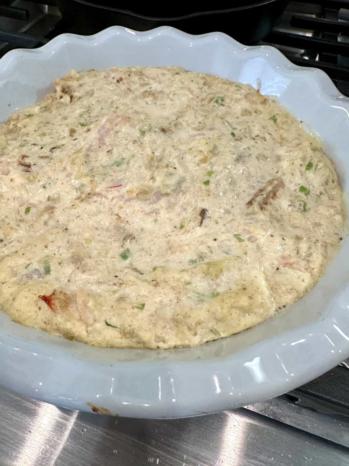 Shrimp and crab dip in a dish.