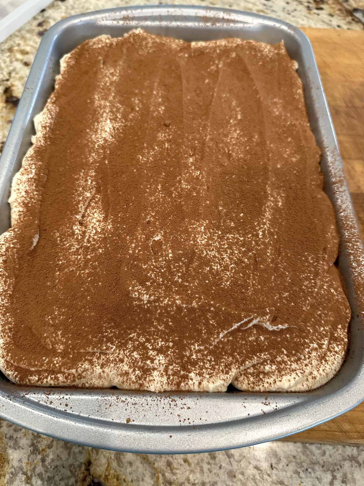 Easy tiramisu cake made from boxed cake mix with mascarpone frosting.