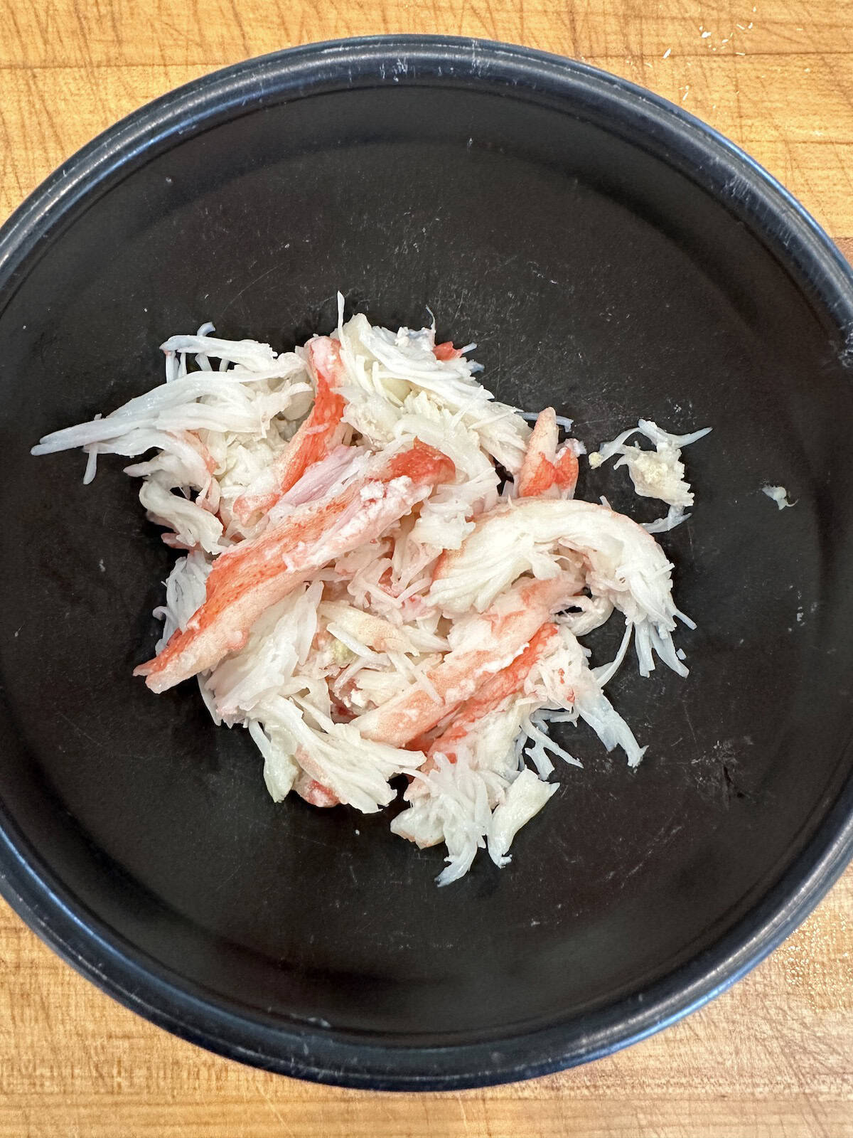 Fresh crabmeat in a bowl.