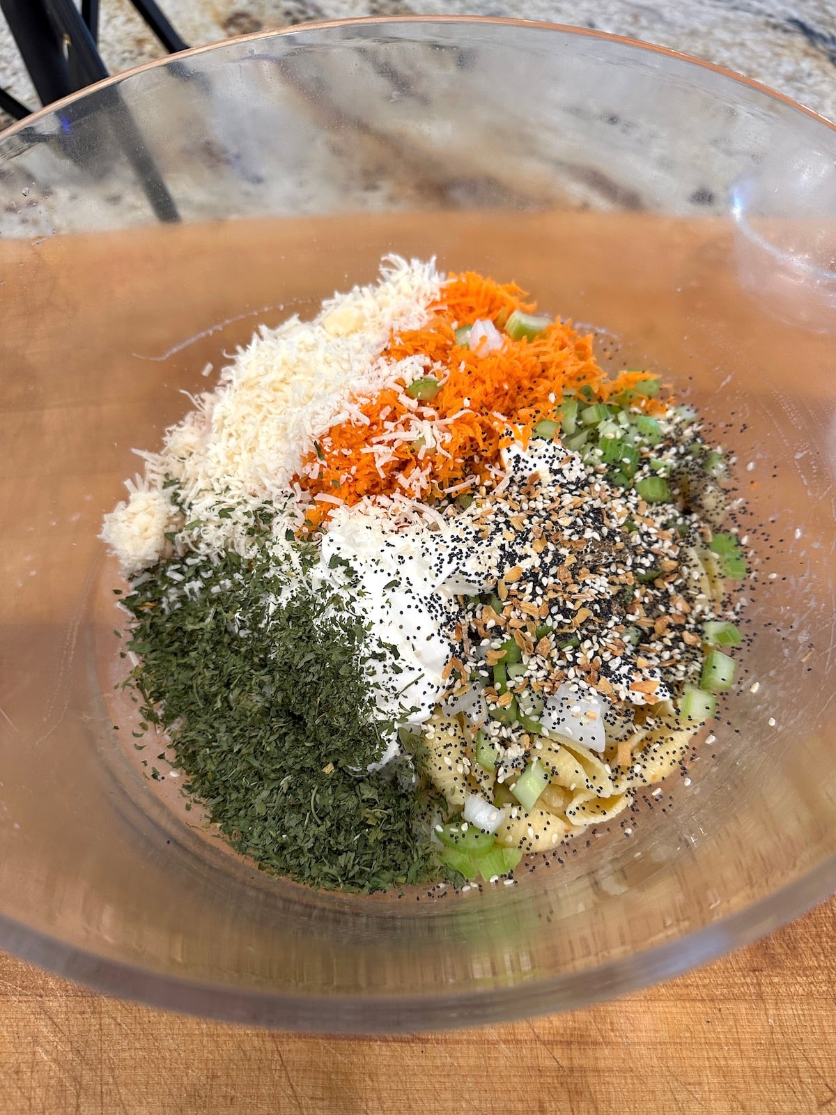 Pasta salad ingredients in a bowl.